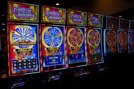 Mobile device showing flokitoto login live dealer table and sportsbook options